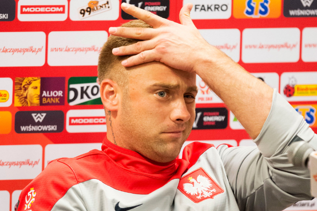 Ex-Celtic goalkeeper Artur Boruc pictured in with Legia Warsaw fans during Rangers clash